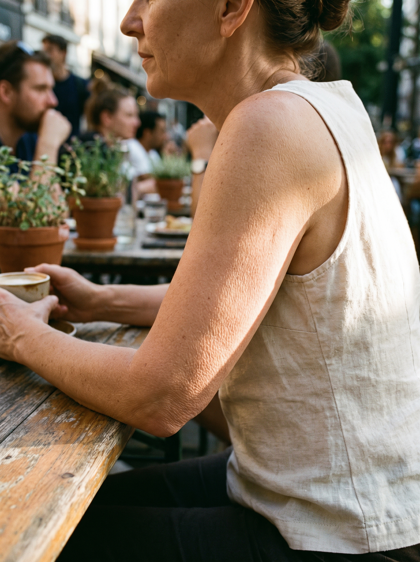 The Summer Cardigan Trap: Why Standard Lotions Fail Sudden Crepey Arms After 50 (And What French Women Use Instead)